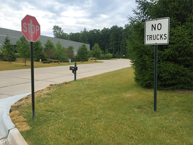 two sign posts, between which the banner will be suspended.