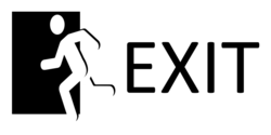 Black Exit On White Banner With Pedestrian To Left
