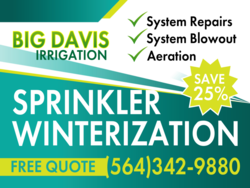White on Slanted Green Sprinkler Winterization Sign With Services and Phone Area